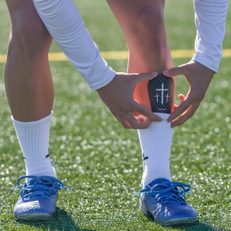 Premium Black Cross Mini Shin Guards for Enhanced Performance